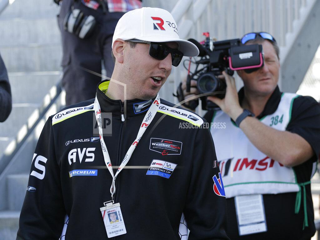 Terry Renna Reigning NASCAR Champion Kyle Busch reacts to a fan before the Rolex 24 hour auto race at Daytona International Speedway, Saturday, Jan. 25, 2020, in Daytona Beach, Fla. Busch will drive a Lexus RC-F GT3 in the race. (AP Photo/Terry Renna)