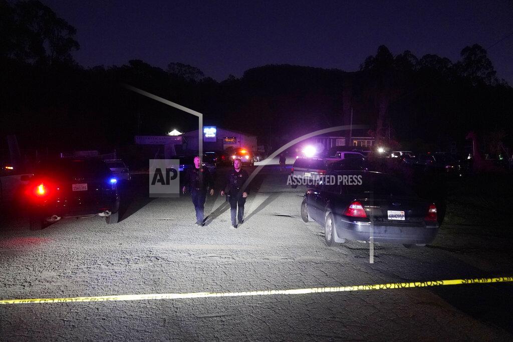 Jeff Chiu Law enforcement personnel control the scene of a shooting Monday, Jan. 23, 2023, in Half Moon Bay, Calif. Multiple people were killed in two related shootings Monday at a mushroom farm and a trucking firm in a coastal community south of San Francisco, and officials say a suspect is in custody. (AP Photo/Jeff Chiu)