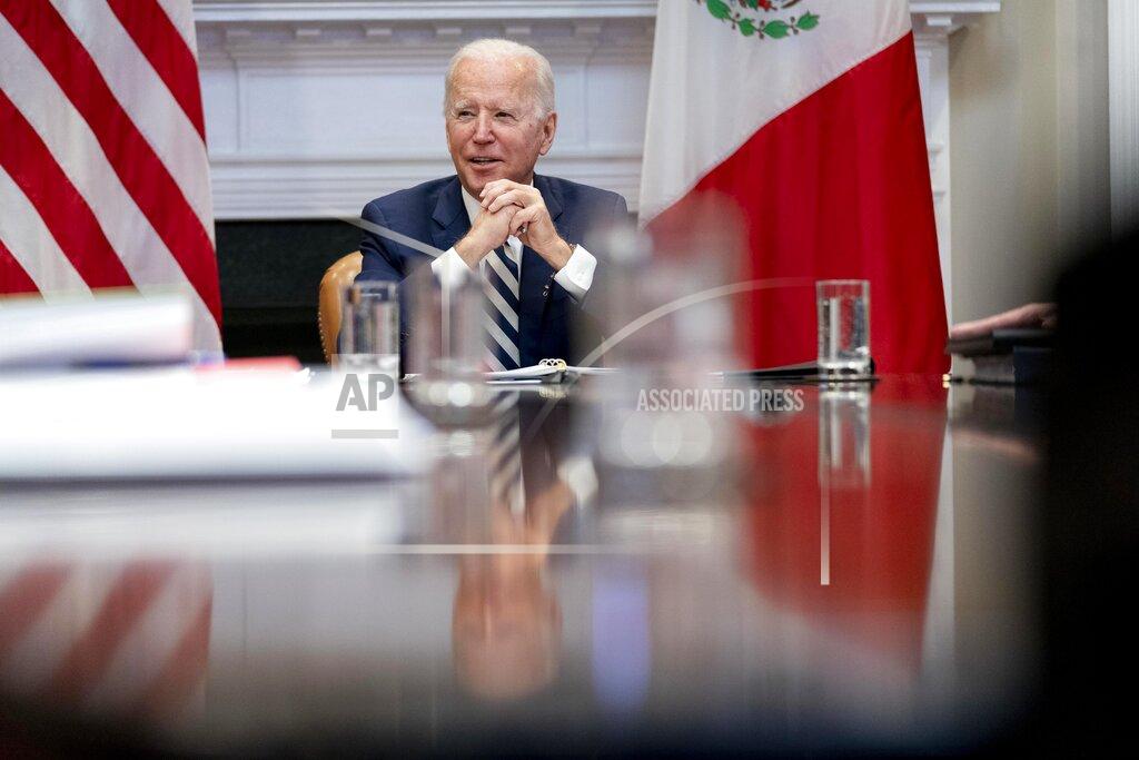 Andrew Harnik President Joe Biden speaks during a virtual meeting with Mexican President Andres Manuel Lopez Obrador, in the Roosevelt Room of the White House, Monday, March 1, 2021, in Washington. (AP Photo/Andrew Harnik)