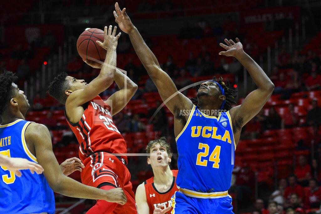 Alex Goodlett Utah guard Alfonso Plummer (25) shoots over UCLA forward Jalen Hill (24) during the second half of an NCAA college basketball game Thursday, Feb. 20, 2020, in Salt Lake City. (AP Photo/Alex Goodlett)