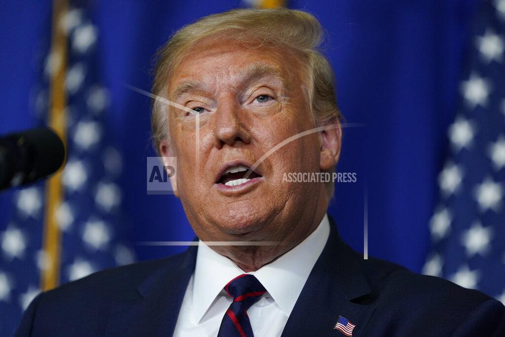 Evan Vucci President Donald Trump speaks during a coronavirus briefing at Bioprocess Innovation Center at Fujifilm Diosynth Biotechnologies, Monday, July 27, 2020, in Morrisville, N.C. (AP Photo/Evan Vucci)