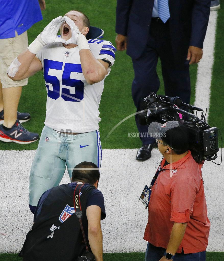 Roger Steinman Dallas Cowboys linebacker Leighton Vander Esch (55) does his signature howl at fans as he walks off the field after a NFC wild-card NFL football game against the Seattle Seahawks, in Arlington, Texas, Saturday, Jan. 5, 2019. The Cowboys won 24-22. (AP Photo/Roger Steinman)