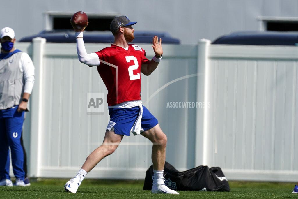 Darron Cummings Indianapolis Colts quarterback Carson Wentz (2) throws during NFL football practice, Thursday, May 20, 2021, in Indianapolis. (AP Photo/Darron Cummings)