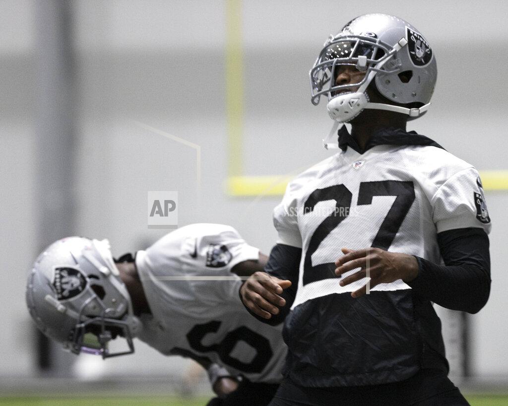 Benjamin Hager Raiders defensive back Trayvon Mullen (27) warms up during an NFL football training camp practice Friday, Aug. 14, 2020, in Henderson, Nev. (Benjamin Hager/Las Vegas Review-Journal via AP, Pool)