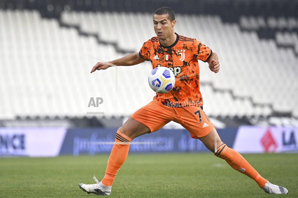 Massimo Paolone Juventus' Cristiano Ronaldo goes for the ball during the Serie A soccer match between Spezia and Juventus, at the Dino Manuzzi Stadium in Cesena, Italy, Sunday, Nov. 1, 2020. (Massimo Paolone/LaPresse via AP)