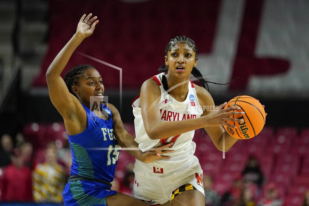 Julio Cortez Maryland forward Angel Reese, right, drives against Florida Gulf Coast guard Tyra Cox during the second half of a college basketball game in the second round of the NCAA tournament, Sunday, March 20, 2022, in College Park, Md. Maryland won 89-65. (AP Photo/Julio Cortez)