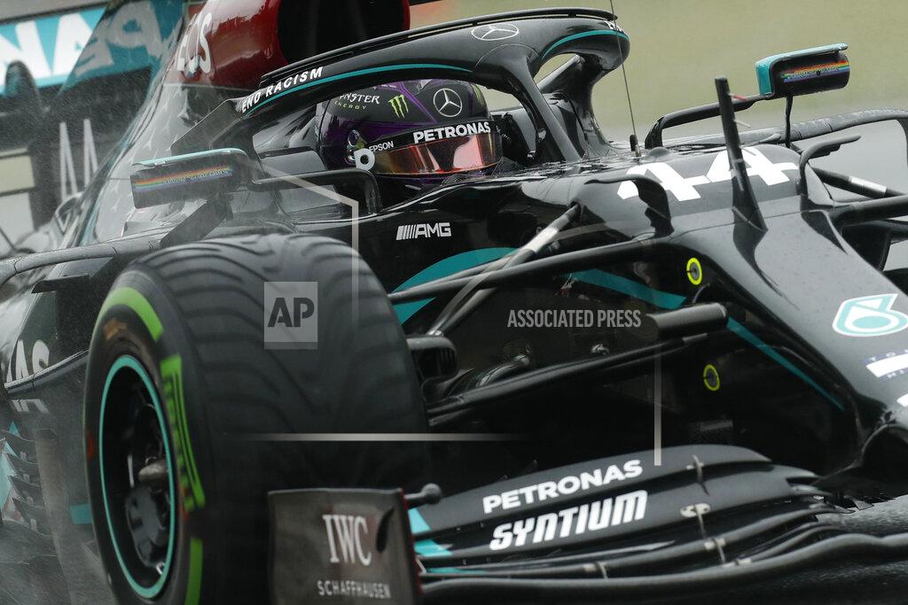 Darko Bandic Mercedes driver Lewis Hamilton of Britain steers his car during the second practice session for the Hungarian Formula One Grand Prix at the Hungaroring racetrack in Mogyorod, Hungary, Friday, July 17, 2020. The Hungarian F1 Grand Prix will be held on Sunday. (Darko Bandic/Pool via AP)