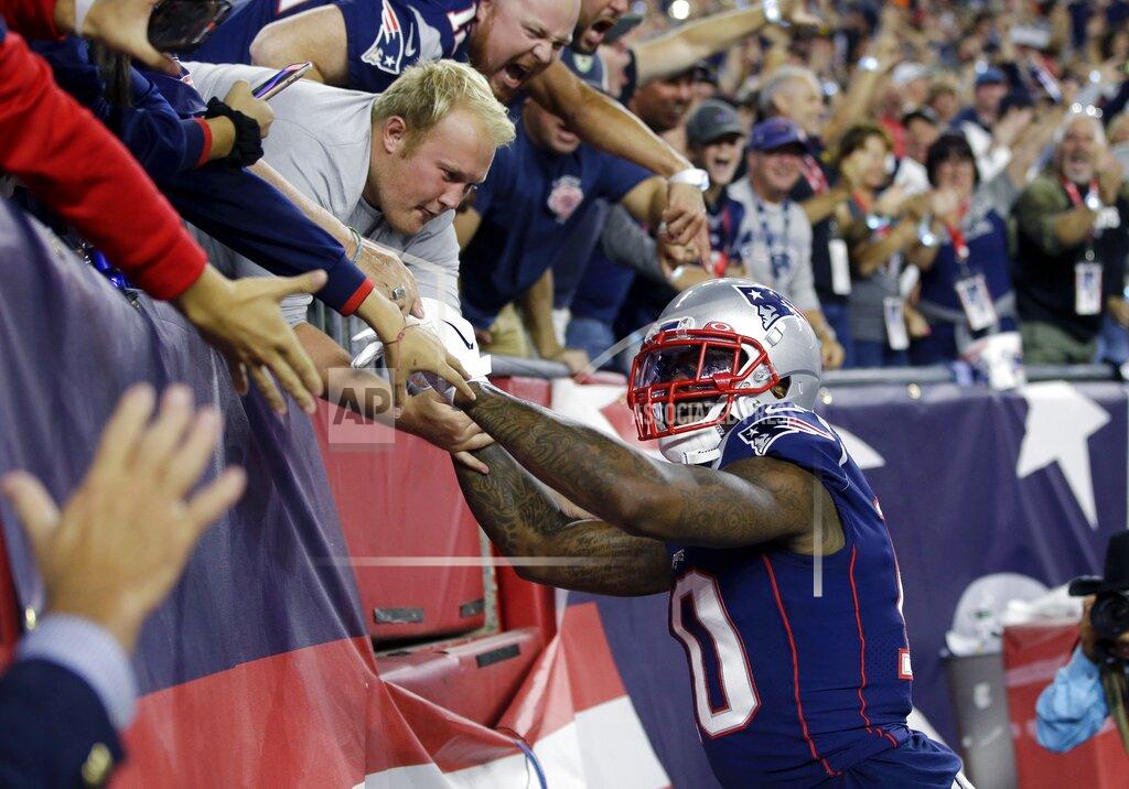 Steven Senne New England Patriots wide receiver Josh Gordon celebrates his touchdown with fans in the first half an NFL football game against the Pittsburgh Steelers, Sunday, Sept. 8, 2019, in Foxborough, Mass. (AP Photo/Steven Senne)