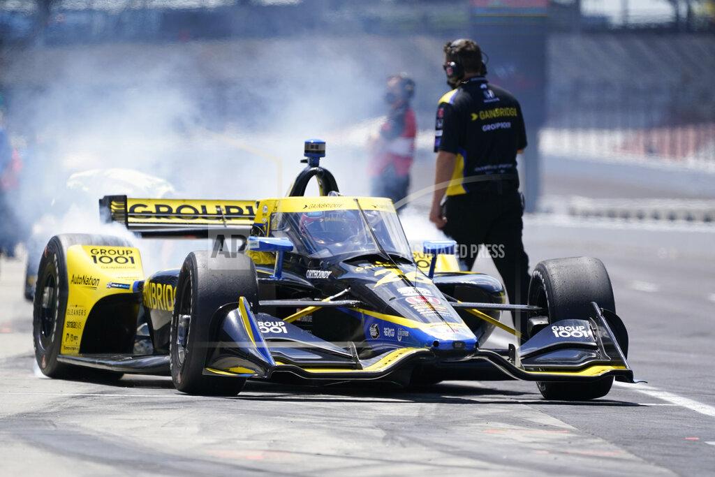 Darron Cummings Colton Herta pulls out of the pits during practice for the IndyCar auto race at Indianapolis Motor Speedway, Friday, May 14, 2021, in Indianapolis. (AP Photo/Darron Cummings)