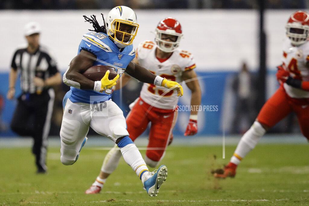 Marcio Jose Sanchez Los Angeles Chargers running back Melvin Gordon runs upfield during the first half of an NFL football game against the Kansas City Chiefs, Monday, Nov. 18, 2019, in Mexico City. (AP Photo/Marcio Jose Sanchez)