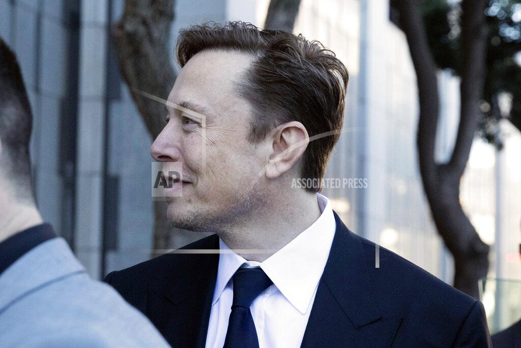 Benjamin Fanjoy Elon Musk leaves the Phillip Burton Federal Building and United States Court House in San Francisco, Tuesday, Jan. 24, 2023. Musk returned to federal court to defend himself against a class-action lawsuit that alleges he misled Tesla shareholders with a tweet about an aborted buyout that the billionaire defiantly insisted Tuesday he could have pulled off, had he wanted. (AP Photo/ Benjamin Fanjoy)