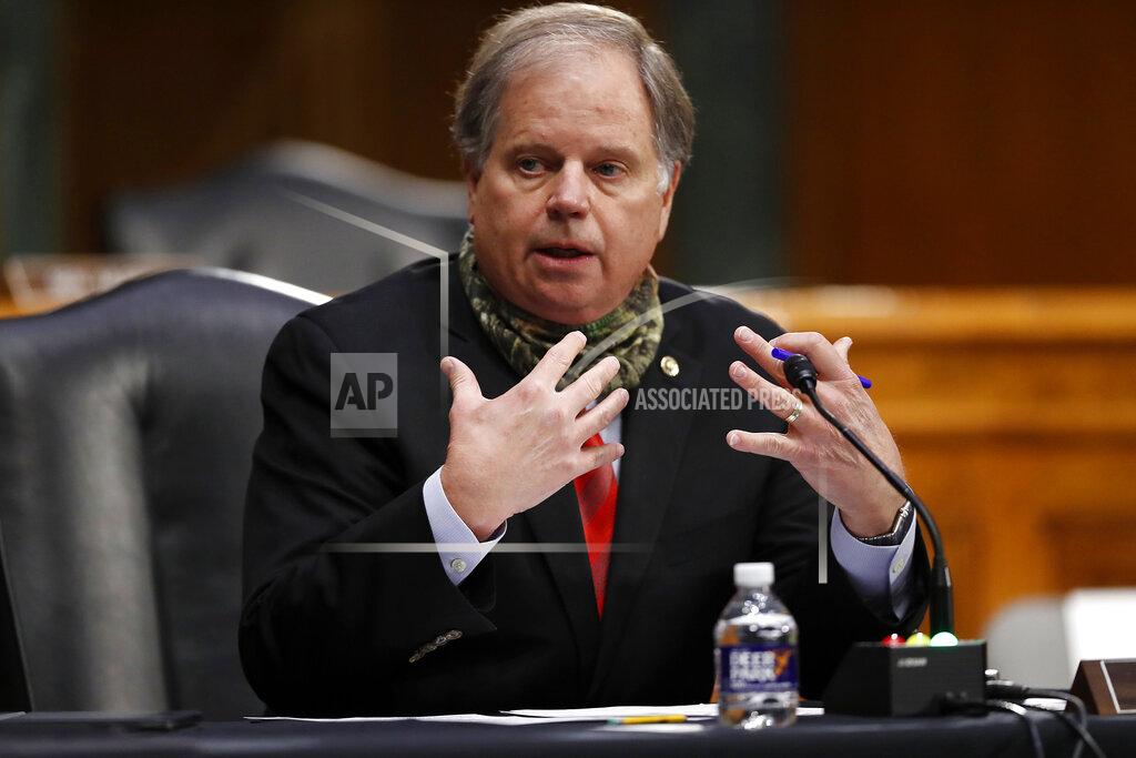 Andrew Harnik FILE - In this Thursday, May 7, 2020, file photo, Sen. Doug Jones, D-Ala., speaks during a Senate Health Education Labor and Pensions Committee hearing on new coronavirus tests on Capitol Hill in Washington. (AP Photo/Andrew Harnik, Pool, File)