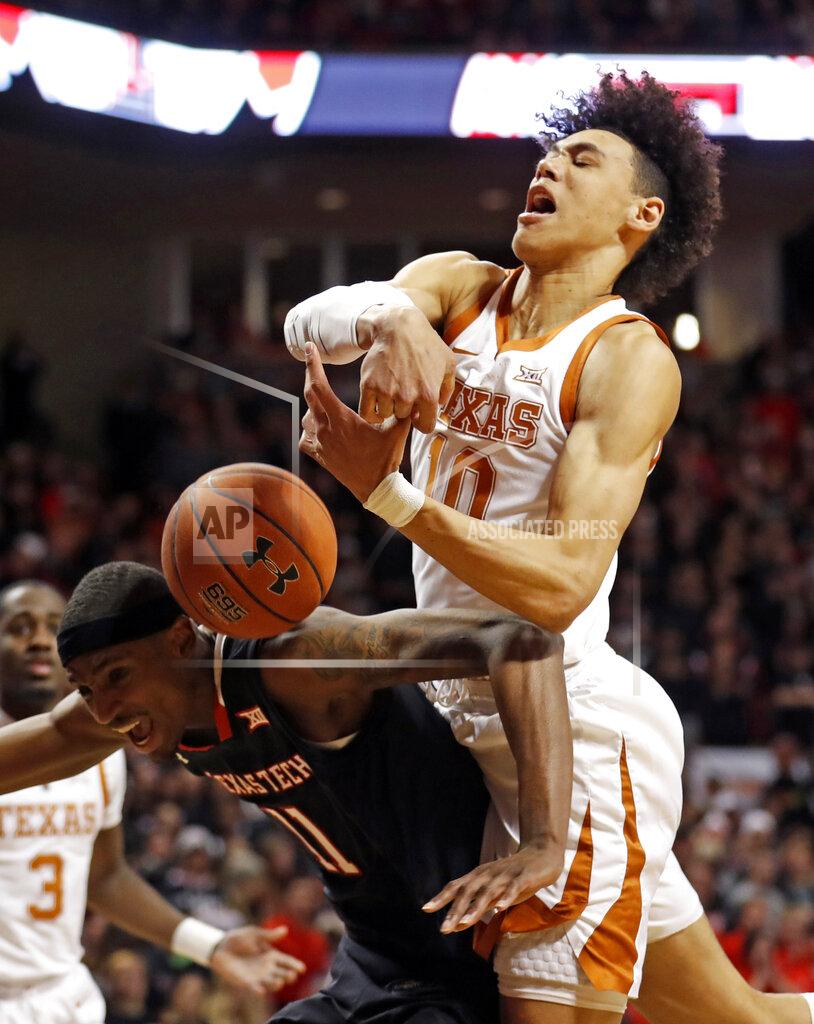 Brad Tollefson Texas' Jaxson Hayes (10) tries to rebound the ball over Texas Tech's Tariq Owens (11) during the first half of an NCAA college basketball game Monday, March 4, 2019, in Lubbock, Texas. (AP Photo/Brad Tollefson)