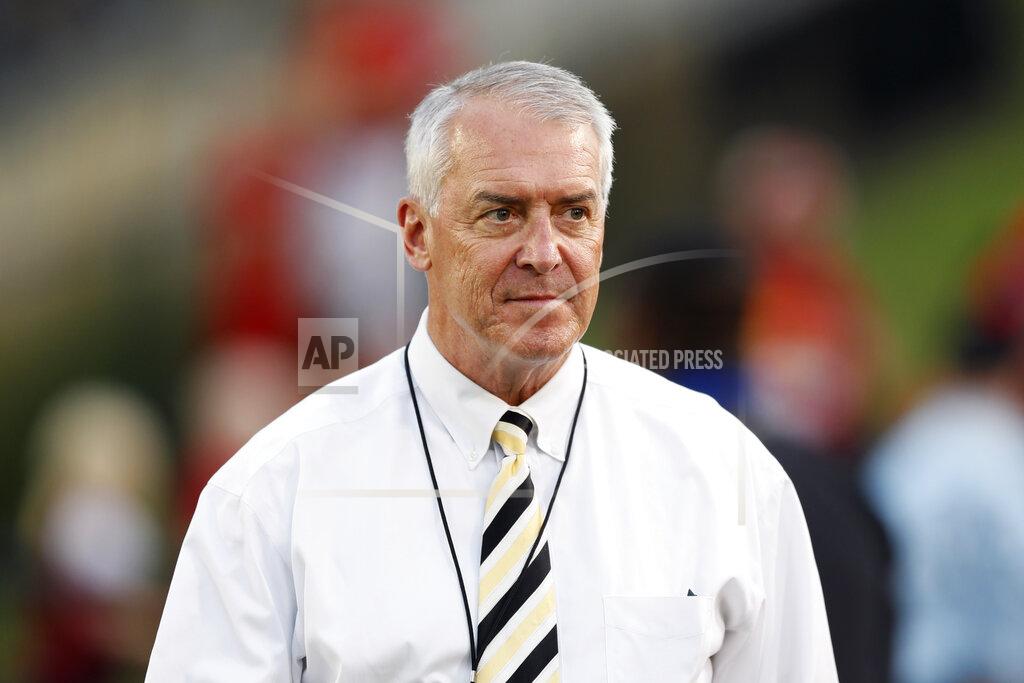 Charlie Neibergall FILE - In this Sept. 14, 2019, file photo, University of Iowa Athletic Director Gary Barta walks on the field before an NCAA college football game between Iowa State and Iowa, in Ames, Iowa. Barta held a news conference Monday, June 15, 2020, where he outlined a plan for the athletic department to improve and build on its diversity and inclusion task force. A number of Iowa assistant coaches are alleged to have mistreated and belittled African American football players.(AP Photo/Charlie Neibergall, File)