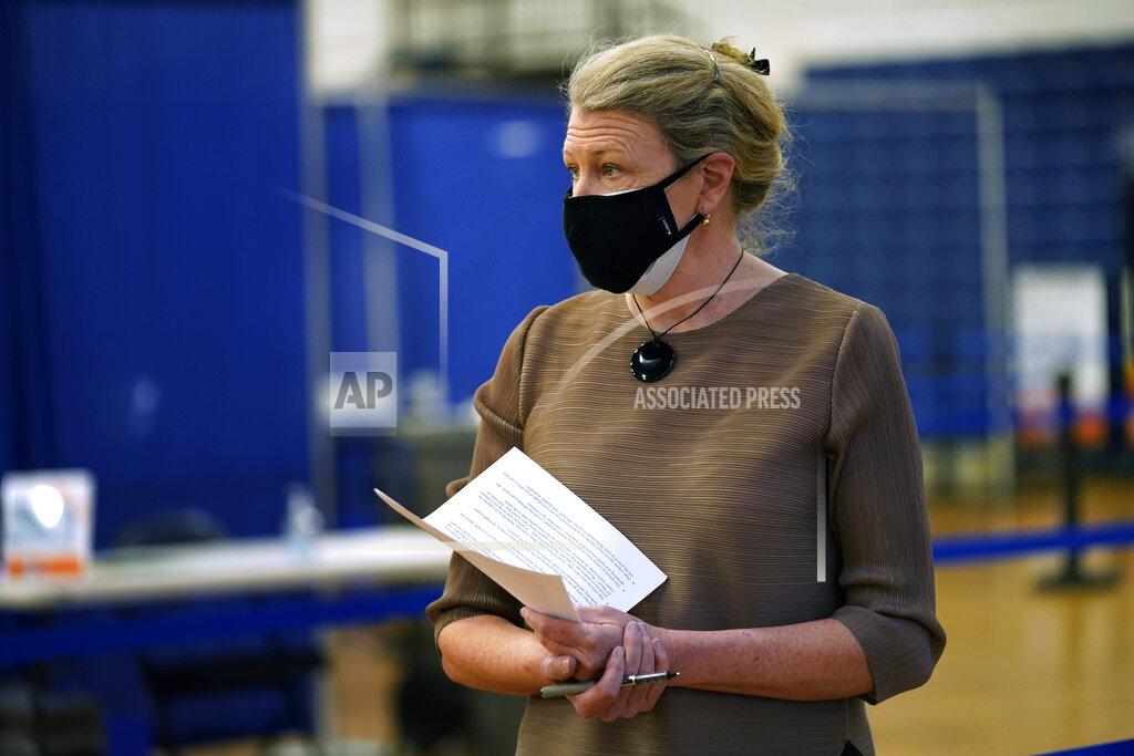 Robert F. Bukaty Commissioner Jeanne Lambrew, of the Department of Health and Human Services, visits a new community COVID-19 vaccination clinic at the Portland Expo, Monday, March 1, 2021, in Portland, Maine. (AP Photo/Robert F. Bukaty)