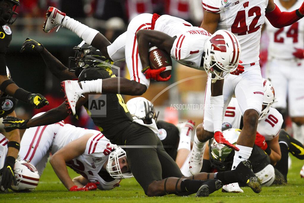 Mark J. Terrill Wisconsin wide receiver Aron Cruickshank runs against Oregon during first half of the Rose Bowl NCAA college football game Wednesday, Jan. 1, 2020, in Pasadena, Calif. (AP Photo/Mark J. Terrill)