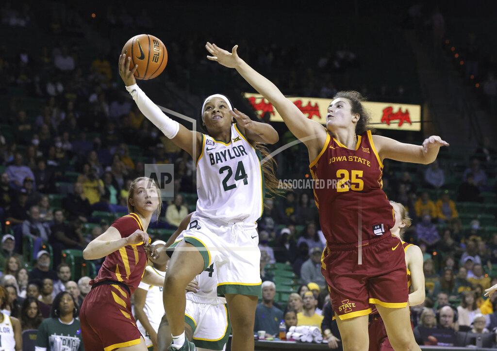 Rod Aydelotte Baylor guard Sarah Andrews (24) scores over Iowa State center Beatriz Jordao, right, in the second half of an NCAA college basketball game, Sunday, Jan. 23, 2022, in Waco, Texas. (Rod Aydelotte/Waco Tribune-Herald via AP)