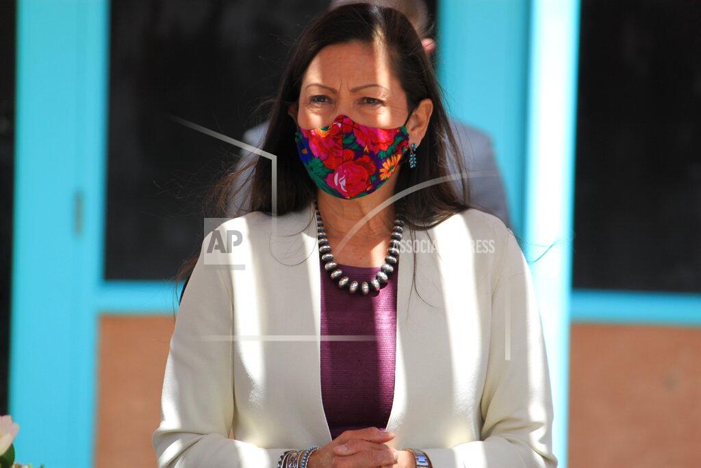 U.S. Interior Secretary Deb Haaland listens to tribal leaders during a round-table discussion at the Indian Pueblo Cultural Center in Albuquerque, N.M., on Tuesday, April 6, 2021. The visit marked Haaland's first to her home state after being confirmed as head of the federal agency, making her the first Native American to hold a Cabinet position. (AP Photo/Susan Montoya Bryan)
