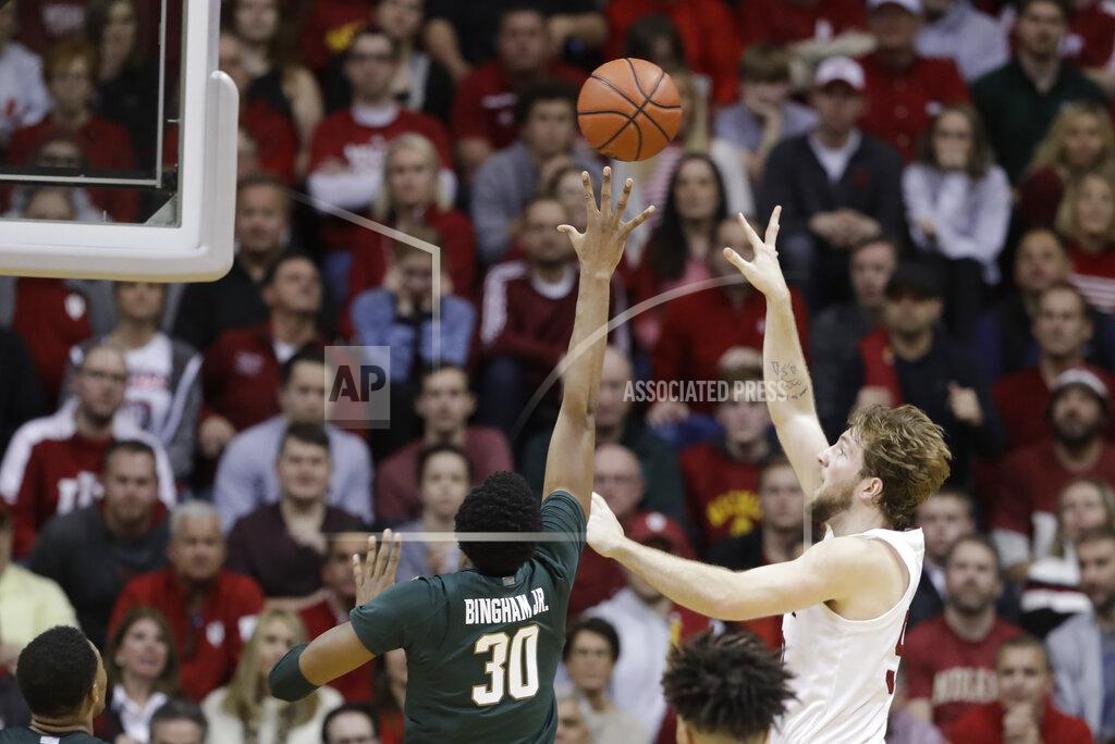 Darron Cummings Indiana's Joey Brunk (50) shoots over Michigan State's Marcus Bingham Jr. (30) during the second half of an NCAA college basketball game, Thursday, Jan. 23, 2020, in Bloomington, Ind. (AP Photo/Darron Cummings)