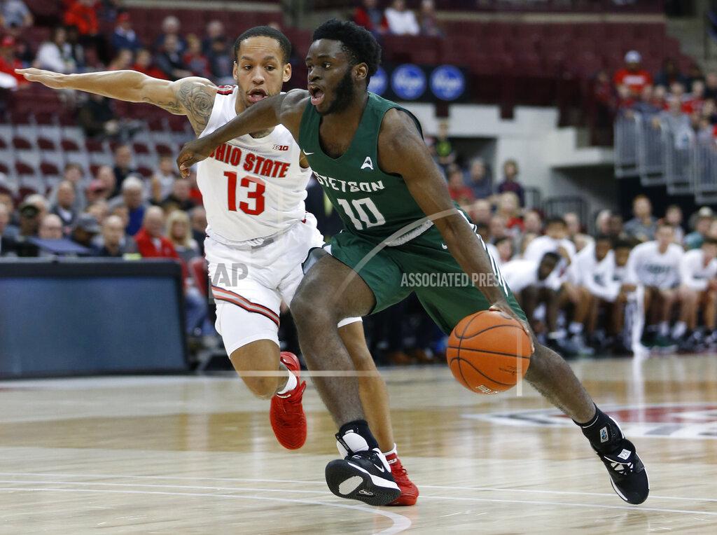 Jay Laprete Stetson's Kenny Aninye, right, dribbles past Ohio State's C.J. Walker during the first half of an NCAA college basketball game Monday, Nov. 18, 2019, in Columbus, Ohio. (AP Photo/Jay LaPrete)