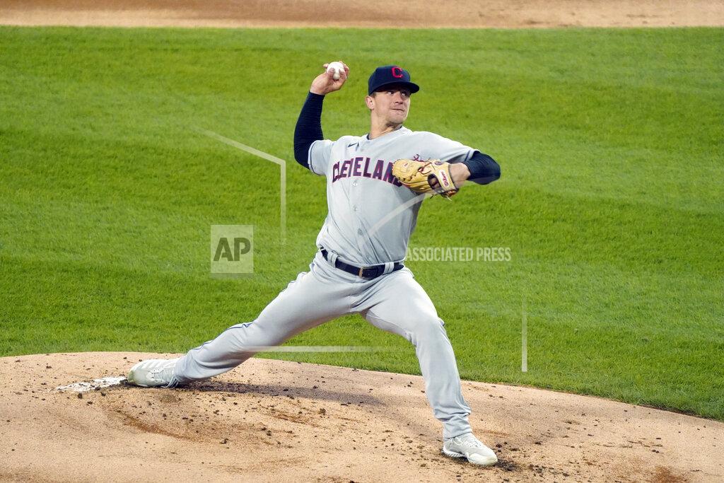 David Banks Cleveland Indians starting pitcher Zach Plesac (34) throws the ball against the Chicago White Sox during the first inning of a baseball game, Wednesday, April, 14, 2021, in Chicago. (AP Photo/David Banks)