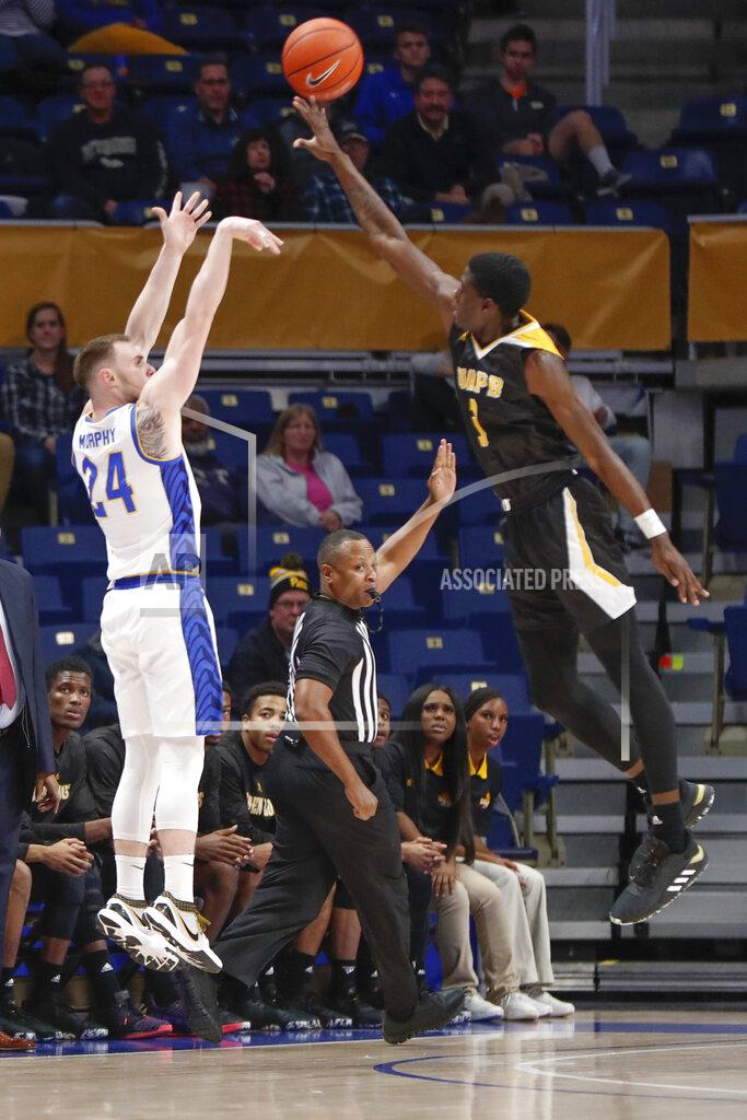 Keith Srakocic Pittsburgh's Ryan Murphy (24) shoots over Arkansas-Pine Bluff's Markedric Bell (3) during the first half of an NCAA college basketball game Thursday, Nov. 21, 2019, in Pittsburgh. (AP Photo/Keith Srakocic)