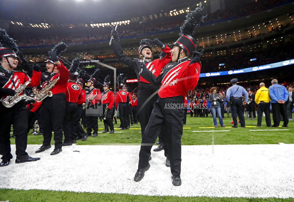 Gerald Herbert Members of the Georgia band dance and sing before the team's Sugar Bowl NCAA college football game against Texas in New Orleans, Tuesday, Jan. 1, 2019. (AP Photo/Gerald Herbert)
