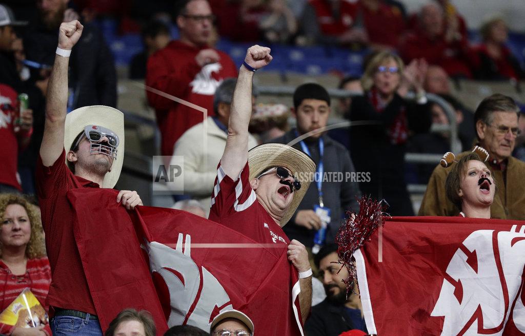 Eric Gay Washington State fans cheer during the the first half of the team's Alamo Bowl NCAA college football game against Iowa State, Friday, Dec. 28, 2018, in San Antonio. (AP Photo/Eric Gay)