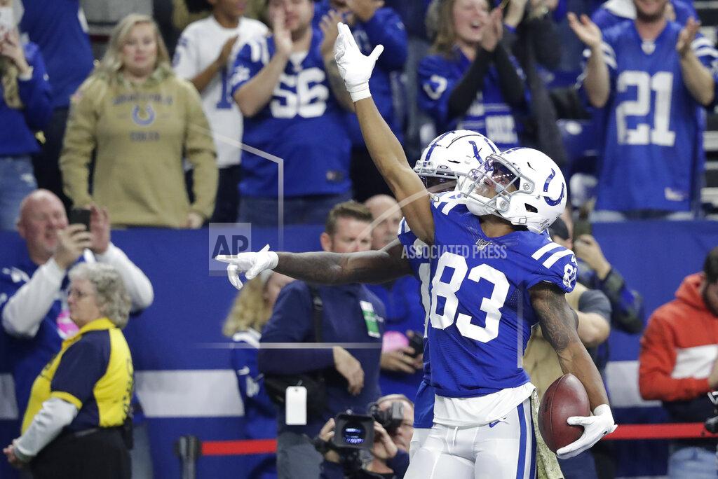 Michael Conroy Indianapolis Colts' Marcus Johnson (83) celebrates after a touchdown reception during the second half of an NFL football game against the Jacksonville Jaguars, Sunday, Nov. 17, 2019, in Indianapolis. (AP Photo/Michael Conroy)