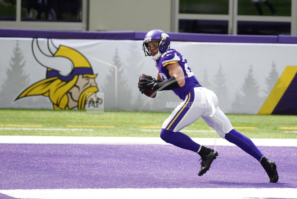 Bruce Kluckhohn Minnesota Vikings strong safety Harrison Smith intercepts a pass in the end zone during the first half of an NFL football game against the Tennessee Titans, Sunday, Sept. 27, 2020, in Minneapolis. (AP Photo/Bruce Kluckhohn)