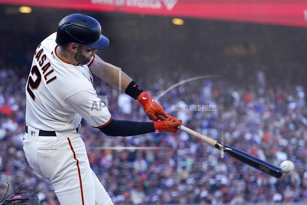 Jeff Chiu San Francisco Giants' Curt Casali hits an RBI-single against the Los Angeles Dodgers during the third inning of a baseball game in San Francisco, Sunday, Sept. 5, 2021. (AP Photo/Jeff Chiu)