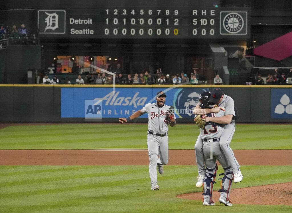 Ted S. Warren Detroit Tigers starting pitcher Spencer Turnbull, right, hugs catcher Eric Haase as third baseman Jeimer Candelario rushes to join them after Turnbull threw a no-hitter in the team's baseball game against the Seattle Mariners, Tuesday, May 18, 2021, in Seattle. The Tigers won 5-0. (AP Photo/Ted S. Warren)