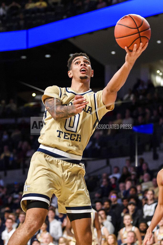 Danny Karnik Georgia Tech guard Michael Devoe (0) makes a layup in the first half of an NCAA college basketball game against Arkansas Monday, Nov. 25, 2019, in Atlanta. (AP Photo/Danny Karnik)