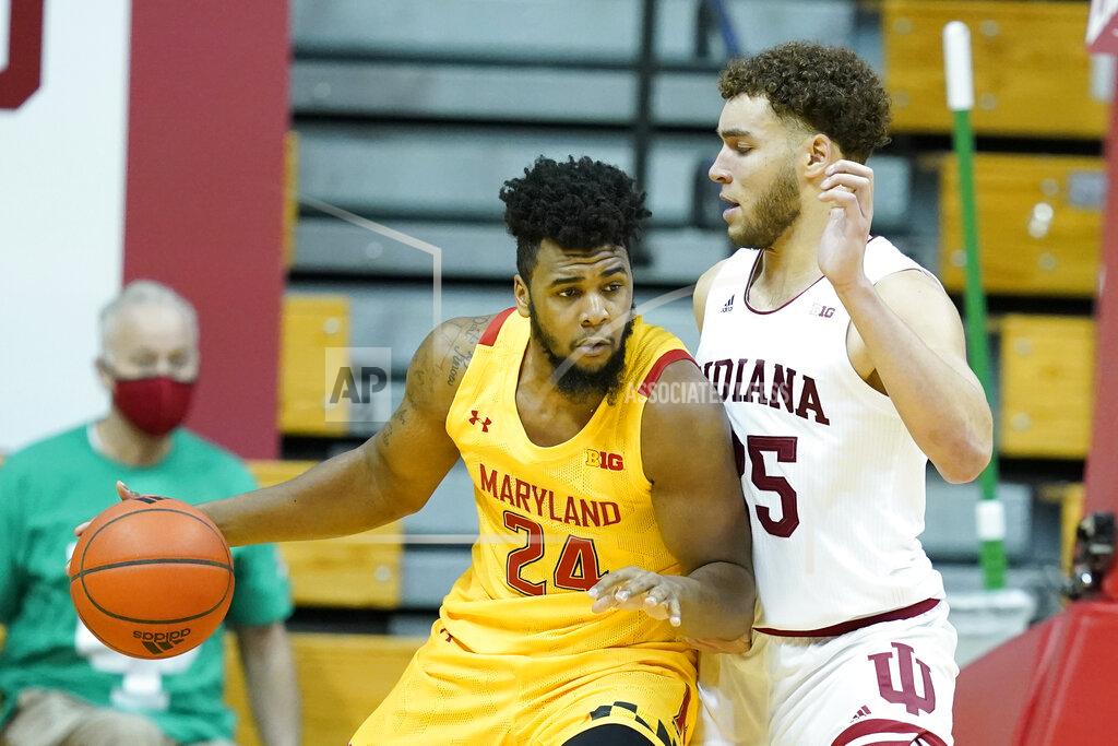 Darron Cummings Maryland forward Donta Scott (24) is defended by Indiana forward Race Thompson (25) during the second half of an NCAA college basketball game, Monday, Jan. 4, 2021, in Bloomington, Ind. (AP Photo/Darron Cummings)