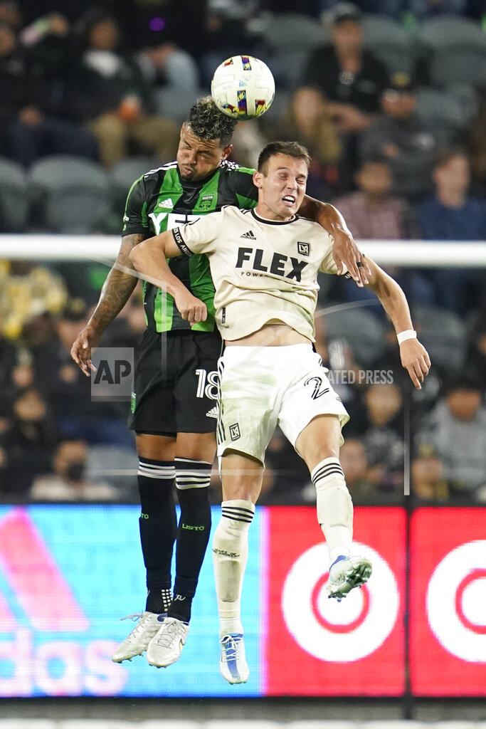 Ashley Landis Austin FC defender Julio Cascante (18) and Los Angeles FC defender Franco Escobar (2) head the ball during the first half of an MLS soccer match in Los Angeles, Wednesday, May 18, 2022. (AP Photo/Ashley Landis)