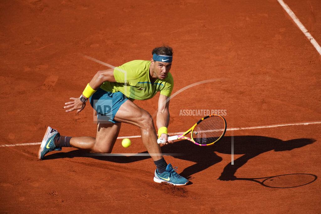 Christophe Ena Spain's Rafael Nadal returns the ball to Netherlands' Botic van de Zandschulp during their third round match of the French Open tennis tournament at the Roland Garros stadium Friday, May 27, 2022 in Paris. (AP Photo/Christophe Ena)