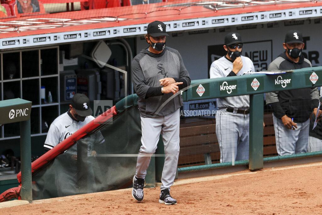 Aaron Doster Chicago White Sox Tony La Russa signals as he takes the field during the ninth inning of a baseball game in Cincinnati, Wednesday, May 5, 2021. The Reds won 1-0. (AP Photo/Aaron Doster)