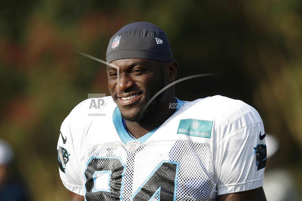 Gerry Broome FILE - In this Aug. 13, 2019, file photo, Carolina Panthers' Efe Obada (94) takes the field during an NFL football training camp in Spartanburg, S.C. For Panthers defensive end Efe Obada the game Sunday between Carolina (3-2) and the Bucs (2-3) is a homecoming. The Nigerian native who arrived in England as a 10-year-old after being trafficked with his sister from the Netherlands, comes back to London as an NFL player and a star attraction after first picking up the sport of American football at age 22. (AP Photo/Gerry Broome, File)