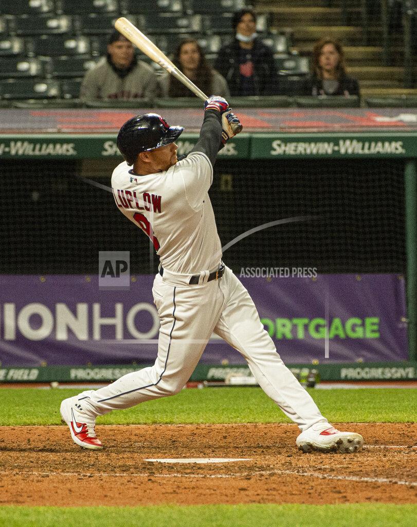 Phil Long Cleveland Indians' Jordan Luplow watches his two-run home run off Minnesota Twins relief pitcher Alex Colome during the tenth inning of a baseball game in Cleveland, Monday, April 26, 2021. (AP Photo/Phil Long)