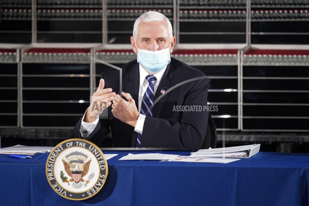 Darron Cummings Vice President Mike Pence speaks during a round table discussion at Catalent Biologics, Tuesday, Dec. 15, 2020, in Bloomington, Ind. (AP Photo/Darron Cummings)