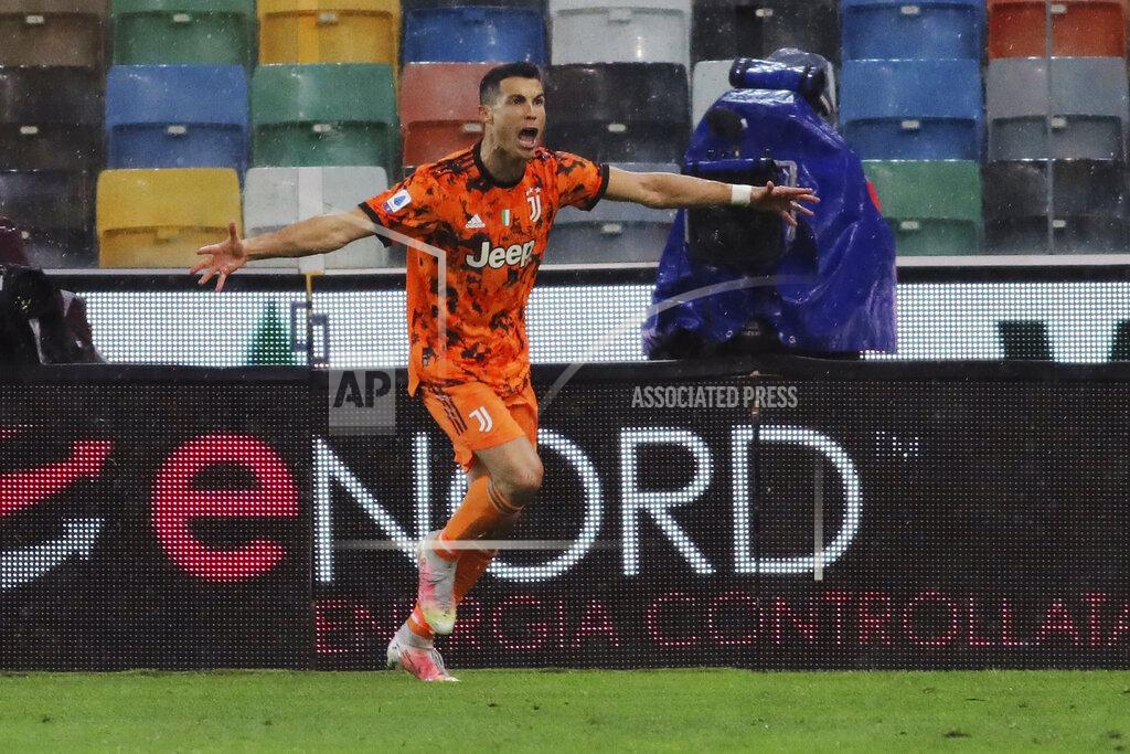 Andrea Bressanutti Juventus' Cristiano Ronaldo celebrates after scoring his second and winning goal during the Italian Serie A soccer match between Udinese and Juventus at the Dacia Arena stadium in Udine, Italy, Sunday, May 2, 2021. (Andrea Bressanutti/LaPresse via AP)