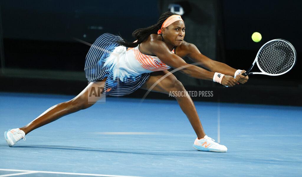 Rick Rycroft United States' Coco Gauff makes a backhand return to Ukraine's Elina Svitolina during their second round match at the Australian Open tennis championship in Melbourne, Australia, Thursday, Feb. 11, 2021.(AP Photo/Rick Rycroft)