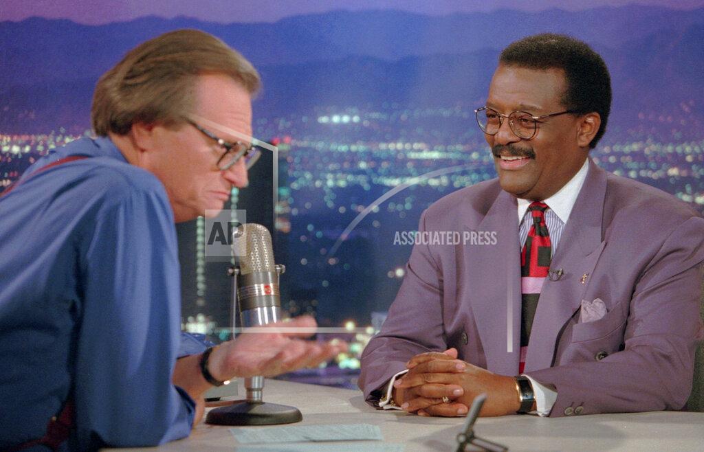 Damian Dovarganes FILE - In this Oct. 4, 1995 file photo, Defense attorney Johnnie Cochran Jr., right, sits for an interview with Larry King, the host of the "Larry King Live" show in the Hollywood section of Los Angeles. King, who interviewed presidents, movie stars and ordinary Joes during a half-century in broadcasting, has died at age 87. Ora Media, the studio and network he co-founded, tweeted that King died Saturday, Jan. 23, 2021 morning at Cedars-Sinai Medical Center in Los Angeles. (AP Photo/Damian Dovarganes, File)