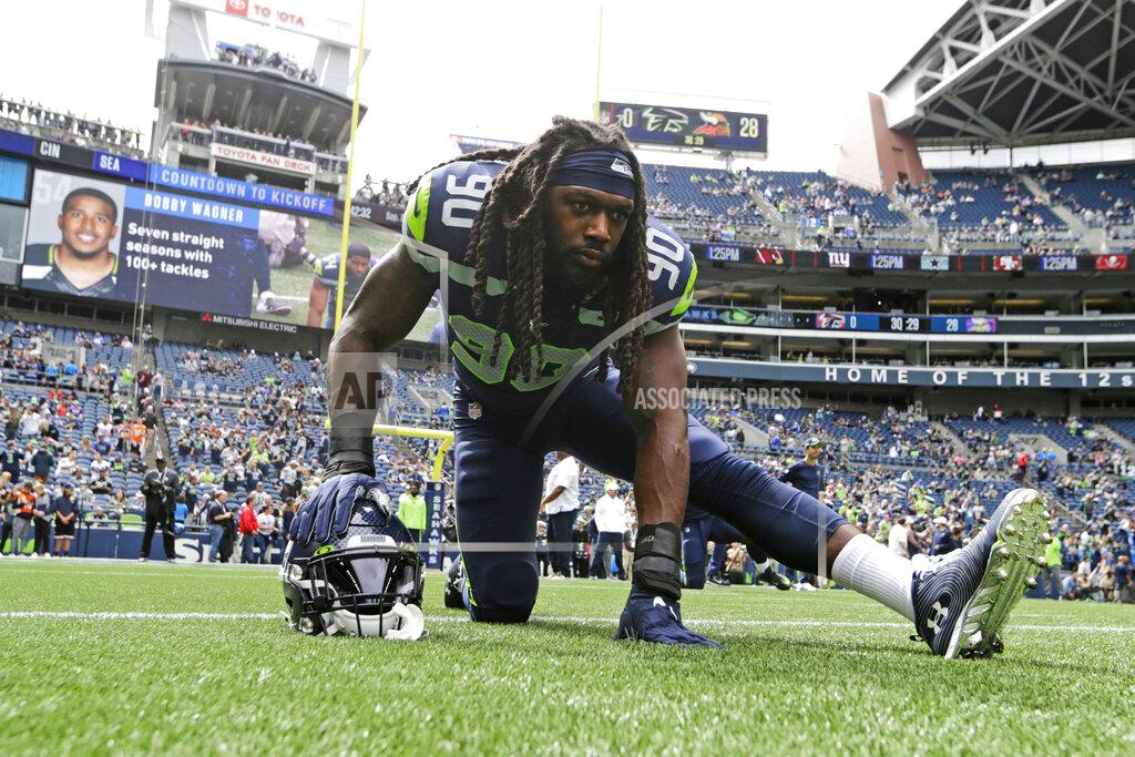 John Froschauer Seattle Seahawks defensive end Jadeveon Clowney stretches before an NFL football game against the Cincinnati Bengals, Sunday, Sept. 8, 2019, in Seattle. (AP Photo/John Froschauer)