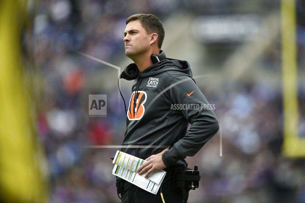 Gail Burton FILE - In this Sunday, Oct. 13, 2019, file photo, Cincinnati Bengals head coach Zac Taylor looks on during the first half of an NFL football game against the Baltimore Ravens, in Baltimore. Being a rookie head coach in the NFL is challenging enough, and also calling plays for the offense only increases the difficulty. Taylor is finding himself criticized and second-guessed for trying to do too much halfway through his first season. (AP Photo/Gail Burton, File)
