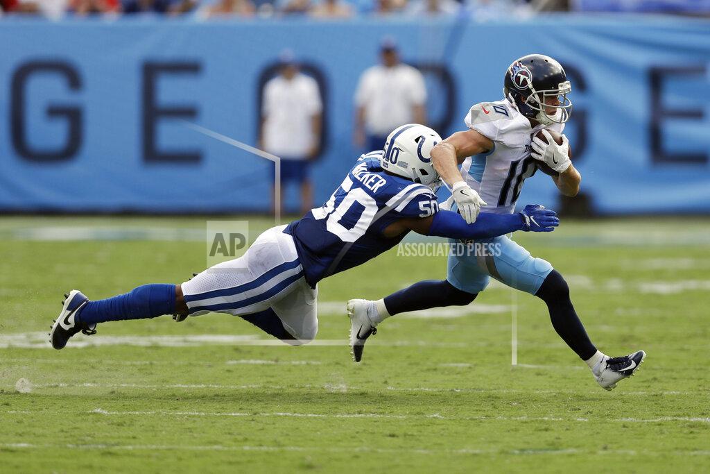 James Kenney Indianapolis Colts middle linebacker Anthony Walker (50) dives for Tennessee Titans wide receiver Adam Humphries (10) in the first half of an NFL football game Sunday, Sept. 15, 2019, in Nashville, Tenn. (AP Photo/James Kenney)