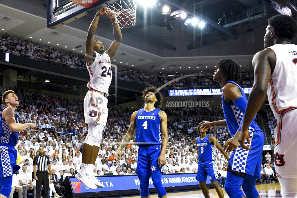 Julie Bennett Auburn forward Anfernee McLemore (24) dunks against Kentucky during the second half of an NCAA college basketball game Saturday, Feb. 1, 2020, in Auburn, Ala. (AP Photo/Julie Bennett)