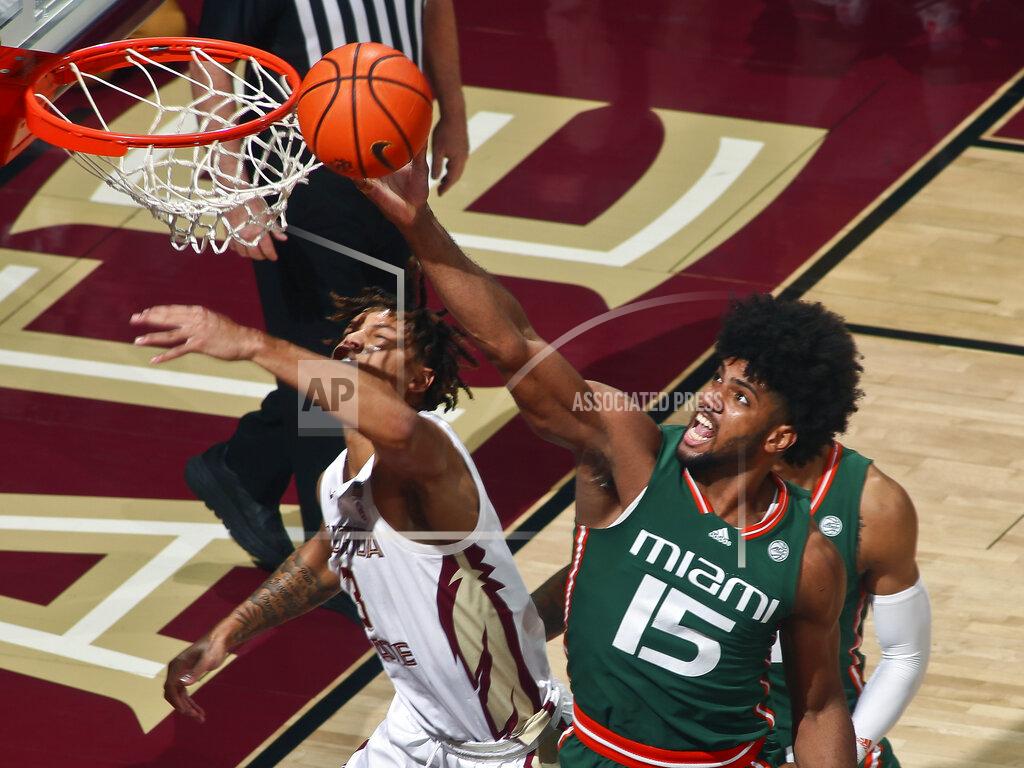 Phil Sears Miami forward Norchad Omier (15) gets a rebound over Florida State forward Cameron Corhen (3) in the first half of an NCAA college basketball game in Tallahassee, Fla., Tuesday, Jan. 24, 2023. (AP Photo/Phil Sears)