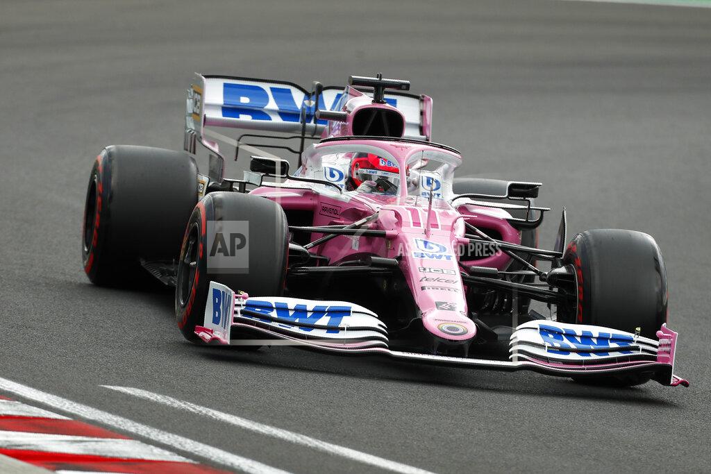 Darko Bandic Racing Point driver Sergio Perez of Mexico steers his car during the qualifying session for the Hungarian Formula One Grand Prix at the Hungaroring racetrack in Mogyorod, Hungary, Saturday, July 18, 2020. The Hungarian F1 Grand Prix will be held on Sunday. (Darko Bandic/Pool)