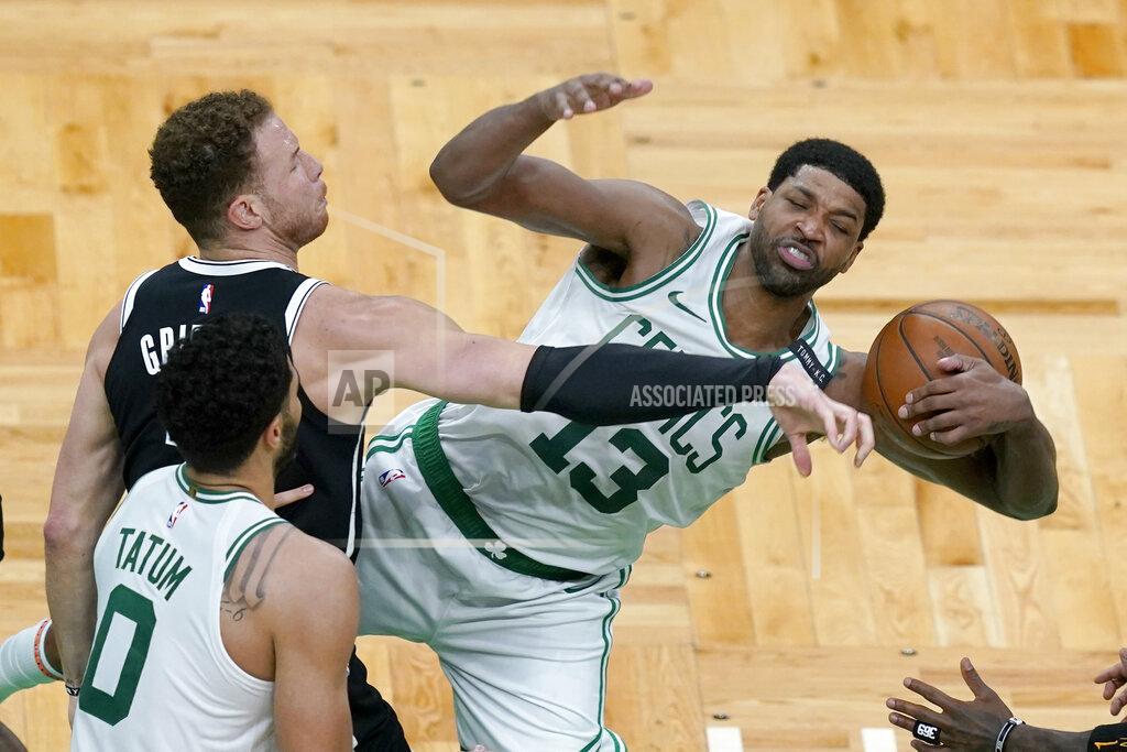 Elise Amendola Boston Celtics center Tristan Thompson (13) grabs a rebound against Brooklyn Nets' Blake Griffin, left, in the second half of Game 4 during an NBA basketball first-round playoff series, Sunday, May 30, 2021, in Boston. (AP Photo/Elise Amendola)